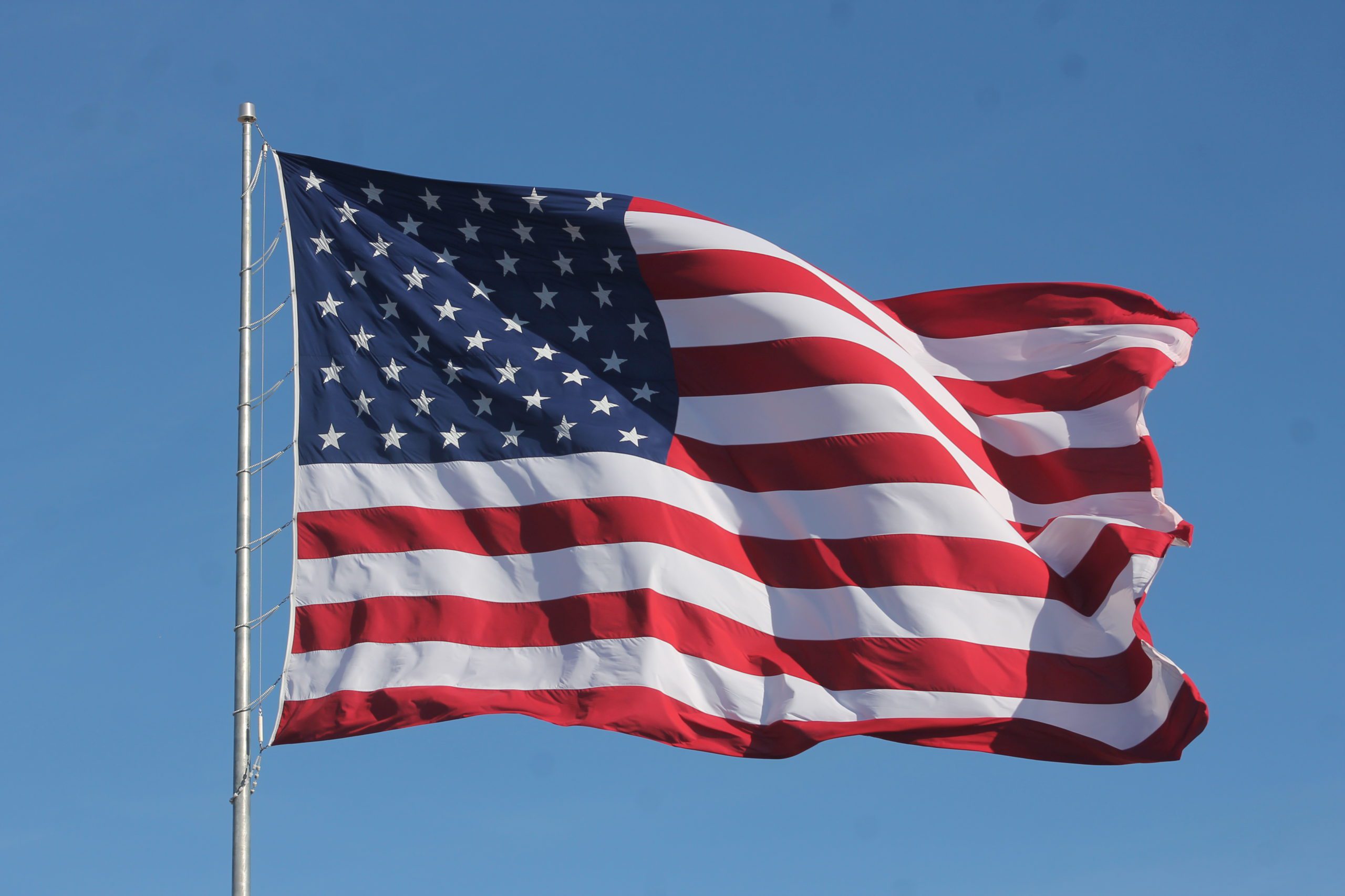 American_Flag_Waving_on_a_Flag_Pole